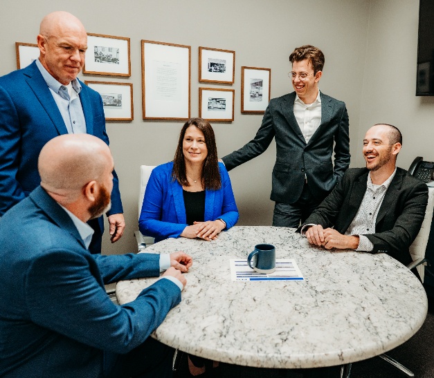 Christian financial planning team meeting in office
